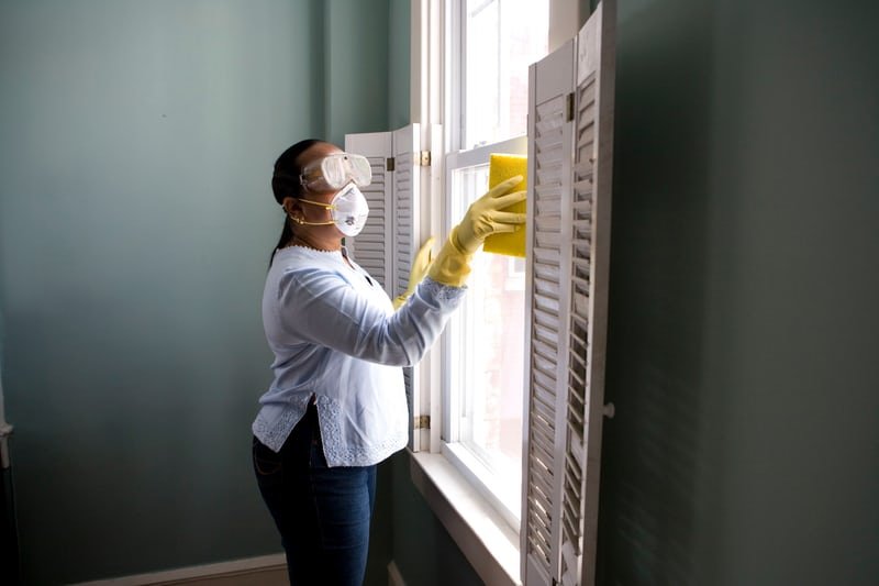 woman cleaning a house