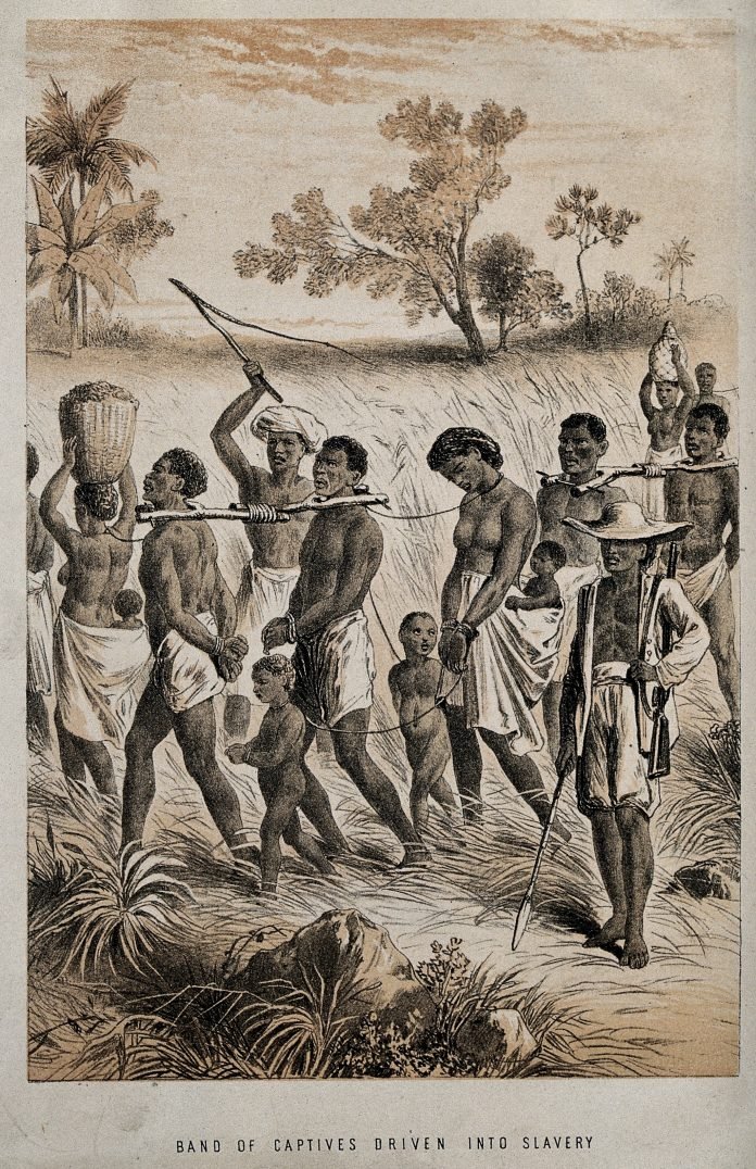 V0050647 Group of men and women being taken to a slave market