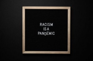 How does racism affect education
